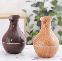 Diffuseur d'huiles essentielles électrique USB 200 ml en gros, humidificateur d'air ultrasonique à grain de bois avec lumières LED pour la maison, le bureau et l'hôtel