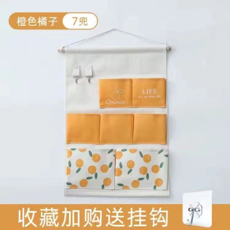 Bolsa colgante naranja de siete bolsillos