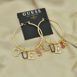 Modemerk Designer Sieraden Lange Oorbellen met Strass en Uitgeholde GUESS-logo Dames Designer Oorbellen - Product Image 1