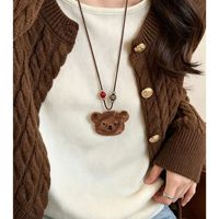 Collier long pour femme avec pendentif tête d'ours en peluche orné de diamants, mignon et unique, accessoire de chaîne pour pull