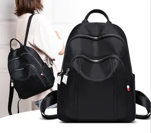 Kız kolej okul çantası seyahat geri paketi moda sırt çantası sırt çantası su geçirmez Polyester Oxford OEM Unisex mektup fermuar Softback