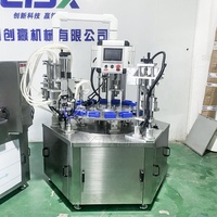 Machine de remplissage, de scellement et de bouchage rotative multifonctionnelle pour flacons de parfum CYJX
