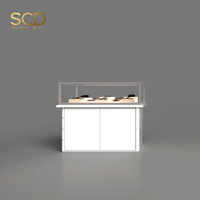 Vitrine à bijoux moderne en bois blanc avec éclairage LED intégré et verre trempé pour la vente au détail