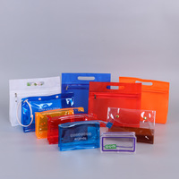 Vente en gros Trousse de toilette cosmétique en PVC coloré Orange clair de voyage avec poignée Trousse de maquillage en PVC avec fermeture éclair
