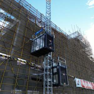 Sc100/100 0-30m/Min DAHAN Nouveau Treuil de Construction à Double Cage pour Marchandises avec Capacité de Charge de 1000KG Hauteur Maximale 60m - Product Image 1