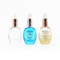 Flacon compte-gouttes en verre transparent de forme ovale pour soins de la peau, Unique, 100ml, avec bouchon en argent et or Rose