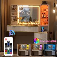 Table de toilette moderne Phoenix Home pour chambre à coucher avec miroir sur pied en verre trempé transparent, éclairage LED RVB et chargeur
