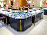 Vitrine personnalisée de bijoux en métal de Delux montre de luxe en or armoire en bois claire à LED boutique de luxe en verre vitrine