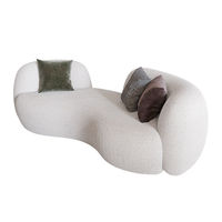 Canapé monoplace en tissu éponge PU de forme irrégulière et courbée, style nordique, design tendance, idéal pour salon et petit appartement