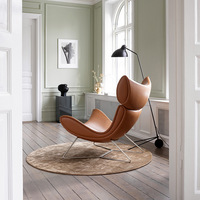 Canapé 1 place en plumes Orange, luxe, styliste décontracté pour salon, fauteuil de salon