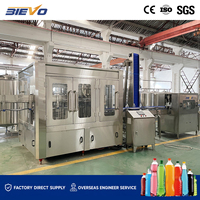 Machine de remplissage automatique de sodas PET 9800 BPH, ligne clé en main pour boissons gazeuses 1L, usine d'embouteillage régionale SUS304