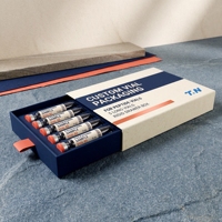 Boîte rigide en carton blanc sur mesure pour peptides avec insert en mousse et impression offset pour usage en soins personnels