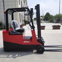 Chariot élévateur électrique à trois roues Jing Xin Long Blue Mini, propulsion arrière, capacité de 1 à 2 tonnes, empileur hydraulique, batterie au plomb-acide, pneus pleins