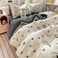 Ensemble de literie en coton lavé avec nœud noir et cœur - Ensemble de literie doux et confortable en 4 pièces pour la chambre des filles