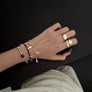 สร้อยคอลูกปัดเกลือพริกไทยสำหรับผู้หญิงสร้อยข้อมือเชือกทอมือสำหรับผู้หญิงดีไซน์ฝูงชนขนาดเล็กโซ่กระดูกไหปลาร้าความรู้สึกสูง - Product Image 4