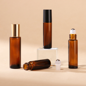 Mini Botellas de Vidrio Ámbar de 6ml, 8ml, 10ml y 15ml con <span class=keywords><strong>Rodillo</strong></span> para Aceites Esenciales y Cuidado de la Piel, con Tapas Doradas, Negras y Plateadas - Product Image 1