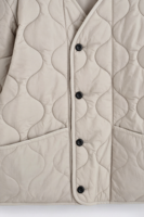 Veste matelassée légère unisexe en gros, style 'Onion', avec boutons, poignets côtelés et poches plaquées, vêtement d'extérieur chaud et décontracté pour l'hiver