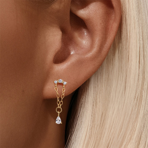 Pendientes CANNER de Oro de 18k y Plata de Ley S925 con Diseño Geométrico de Zirconia en Forma de Estrella y Borla - Product Image 6