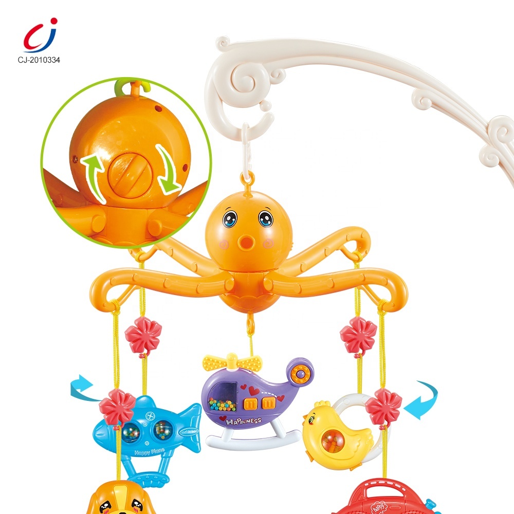 Giraffe crib mobile toy for a baby bed