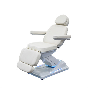Lits de beauté modernes et luxueux avec base en acier inoxydable et commande au pied, lit de beauté électrique pour soins du visage, spa et massage. - Product Image 1