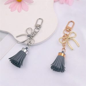 Nouveau <span class=keywords><strong>Pendentif</strong></span> Porte-clés en Alliage avec Nœud Papillon et Pompon en Cuir Doré/Argenté, Accessoire DIY pour Sac à Main Femme - Product Image 2