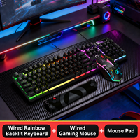 Clavier, souris et tapis de souris filaires 3 en 1 avec rétroéclairage arc-en-ciel pour accessoires informatiques en gros