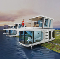 Maison d'hôtes en conteneur en acier léger à deux étages, mobile, modulaire, hôtel dans une zone panoramique, capsule spatiale, design moderne, personnalisable