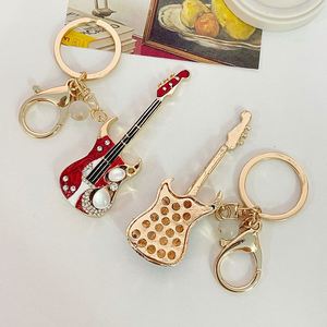 גיטרה Keychain עבור אוהבי מוסיקה מיני חמוד בס פרל ריינסטון מפתח שרשרת טבעת לילדים רכב מתכת מפתח טבעת חשמלי גיטרה מפתח - Product Image 6