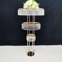 2026 Accessoires de décoration de scène de mariage : Support à fleurs en cristal en fer forgé électroplaqué, style grande roue, avec support de fleurs en acrylique