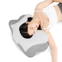 Oreiller ergonomique en mousse à mémoire de forme pour l'alignement de la colonne vertébrale et la traction cervicale