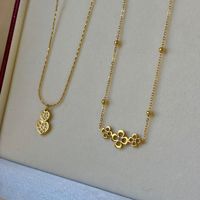 Collier en acier inoxydable avec pendentif fleur cœur marguerite pour femme, doré, double chaîne superposée, ras-du-cou, bijou minimaliste, cadeau