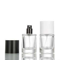Bon marché 30ml 50 ml flacon de parfum vaporisateur vide vintage fumé super clair givré 50 ml flacons de parfum ronds en verre avec pulvérisateur de brouillard