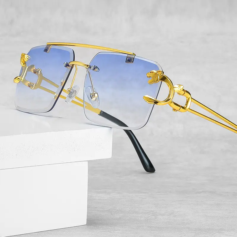 Occhiali da sole senza montatura con Design a tigre occhiali da sole con personalità UV400 occhiali da sole alla moda con bordo tagliato a diamante senza montatura a doppio raggio