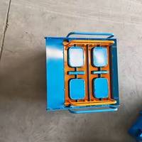 Machine manuelle de formage de blocs pour usage domestique Petites machines africaines en briques non cuites avec noyau moteur pour briques creuses en ciment