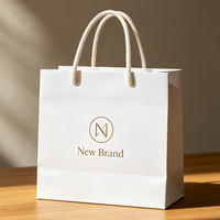 Sacs en papier personnalisés Ching TA, sacs de shopping en matériau recyclable avec laminage mat pour l'emballage de vêtements, logo