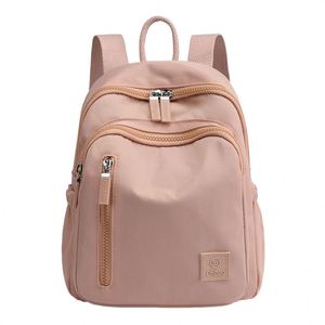 Mochila femenina casual impermeable para viajes con gran capacidad e ideal para actividades al aire libre. - Product Image 1