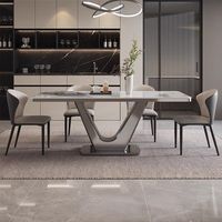 Table à manger rectangulaire extensible de style italien en acier inoxydable durable avec plateau en pierre frittée à motif marbre gris, assemblée