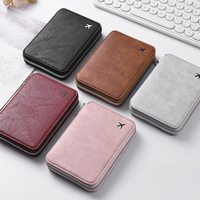 Porte-cartes et passeport transfrontalier en PU avec fermeture éclair, emplacements pour cartes de crédit et cartes de visite, grande capacité, rangement pour billets d'avion, mode voyage