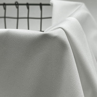 Tissu brocart tricoté warp 100% polyester résistant à l'abrasion 210g/m, tissu uni teint extensible pour t-shirts de sport