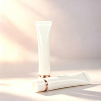 Tube cosmétique de luxe à bouchon souple avec bordure dorée, embout long, en plastique, diamètre 30 mm, logo personnalisé