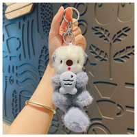 Porte-clés en peluche de loutre marine de dessin animé, doux, léger, portable, pendentif pour sac d'école, figurine mignonne pour étudiant, décoration
