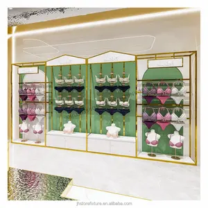Shop desain pakaian dalam rak display dengan kabinet emas lingerie tampilan lantai berdiri furnitur untuk toko ritel kustom