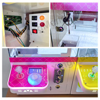 Mini máquina de garra Juegos que funcionan con monedas Máquina de garra pequeña Mini máquina de garra de mesa a la venta