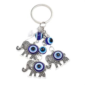 Nuovo Portachiavi con Piccolo Ciondolo a Forma di Palma, Elefante, Tacchino con Occhi Blu per Borsa e Auto - Product Image 5