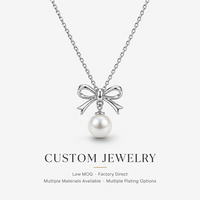 Pendentif en perle délicat personnalisé Mosen, conçu avec un joli nœud, idéal pour les soirées romantiques aux chandelles et les tenues à la française.