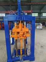 Machine à fabriquer des blocs de ciment manuelle TENGFEI QT4-40 pour briques de pavage pleines et creuses avec moteur 220V 380V
