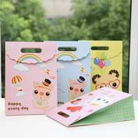 Sac en papier kraft écologique avec logo personnalisé et tableau ivoire pour cadeaux d'anniversaire de bébé vêtements et chaussures pour enfants
