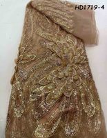 Tissu en dentelle de luxe français écologique en mousseline africaine rouge bordeaux brodé avec des perles et des cordons guipure