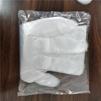 Gants jetables en plastique pour mains