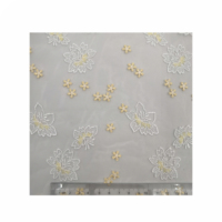 Tissu en dentelle brodée à motifs floraux superposés pour robes de mariée et robes de soirée